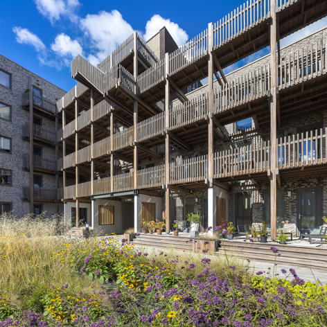 Op deze slide wordt getoond Houtbouw in woningcomplex Laurierkwartier in Utrecht.